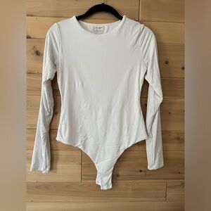 Women’s white bodysuit.